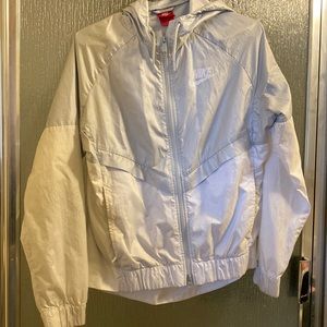 Gray and white Nike windbreaker